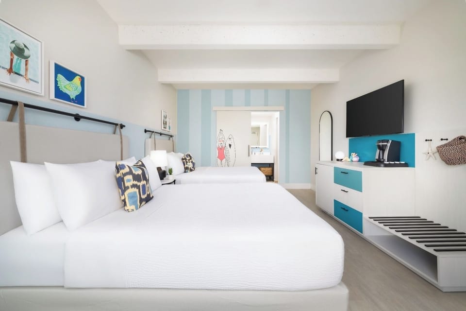 Unwind in airy comfort with two plush beds and space.