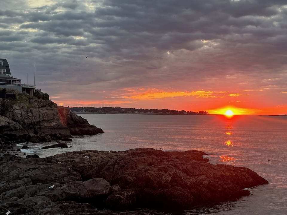 Sunrise from our neighborhood beach.
