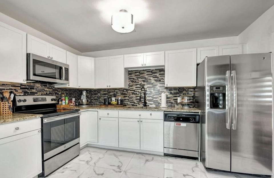 Kitchen along with 6 seater dining table.