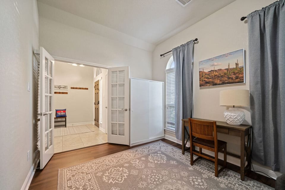 A versatile office/den with a cozy day bed.