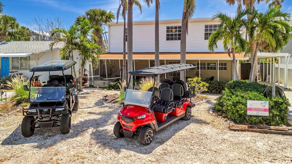 TWO 6-person golf carts with booking.