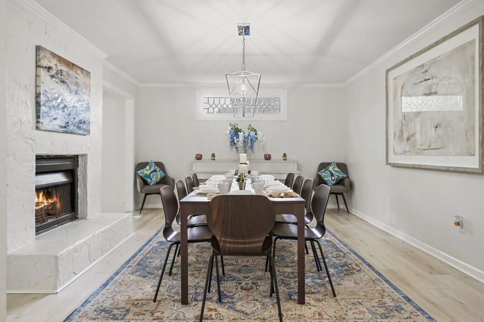 Dining Room 2 | Elegant Table Setting with Fireplace and Modern Lighting