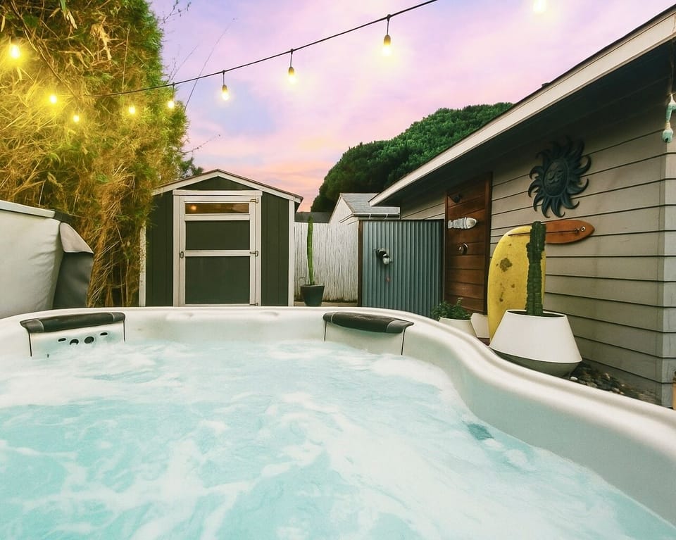 The private hot tub is a great place to unwind after a long beach day!