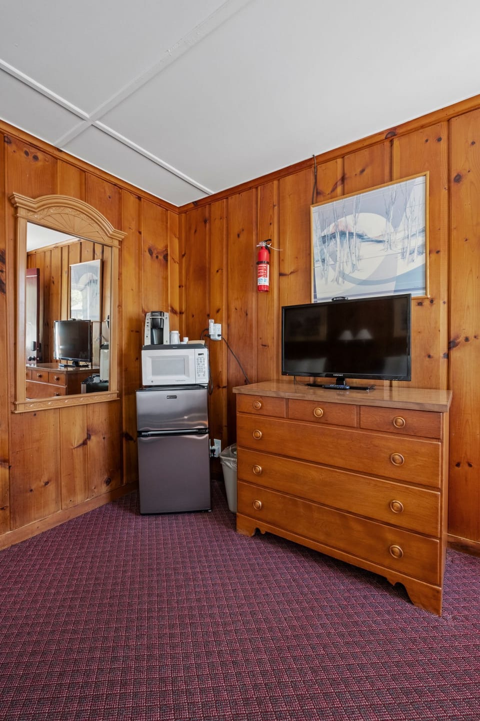 Kick back in a thoughtfully updated space with a Roku TV, mini-fridge, microwave, and coffee bar - perfect for morning brews or late-night snacks.