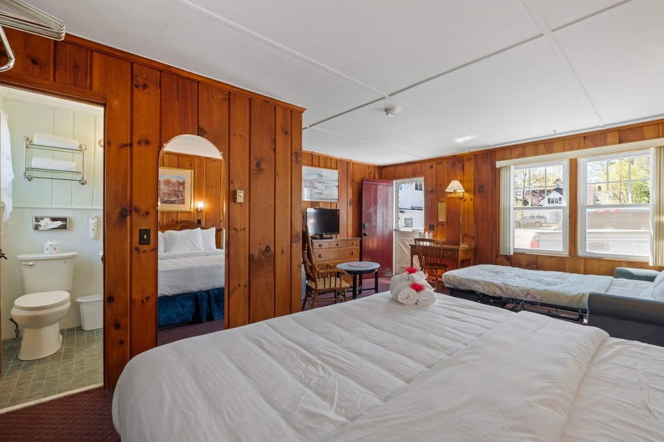 Private bathroom just off the main space, equipped with fresh towels and essential amenities.