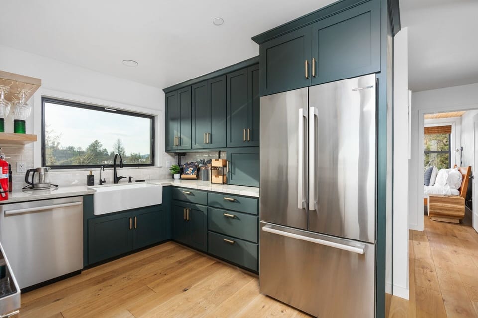 Our fully loaded kitchen features a full-size fridge, blender, microwave, toaster, waffle iron, and more — all set for your culinary adventures! ‍‍
