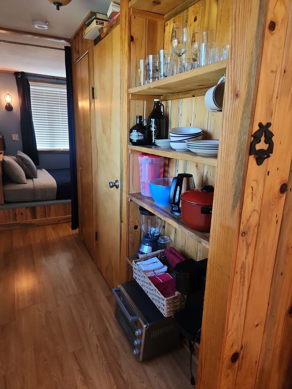Fully stocked with a variety od appliances and dishes, for your use.