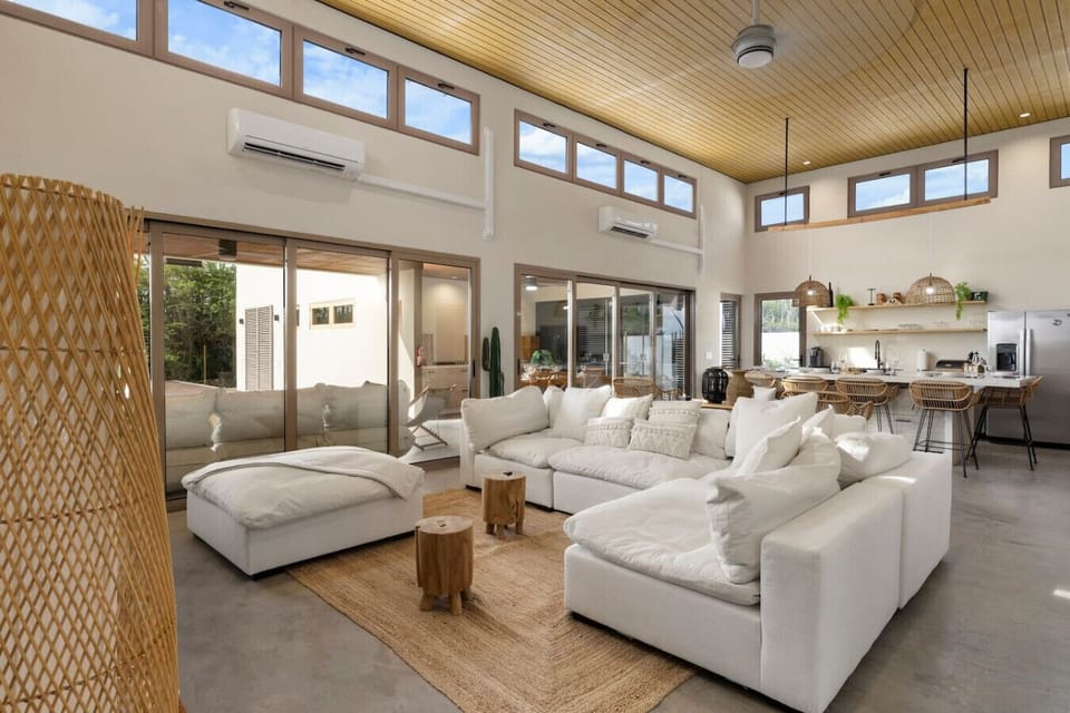 Laid-back comfort meets island style in this bright, airy living space at Halifat 5. Perfect for slow mornings, movie nights, and everything in between.
