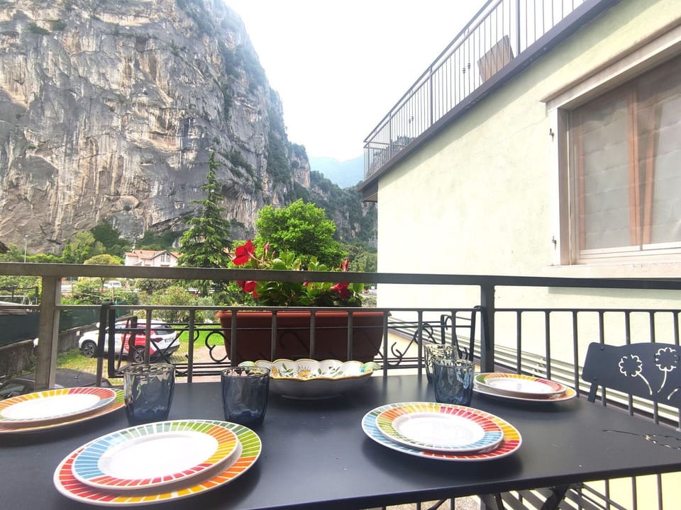 Furniture, Table, Chair, Kitchen & Dining Room Table, Mountain Range, Restaurant, Outdoor Table, Outdoor Furniture, Coffee Table, Balcony