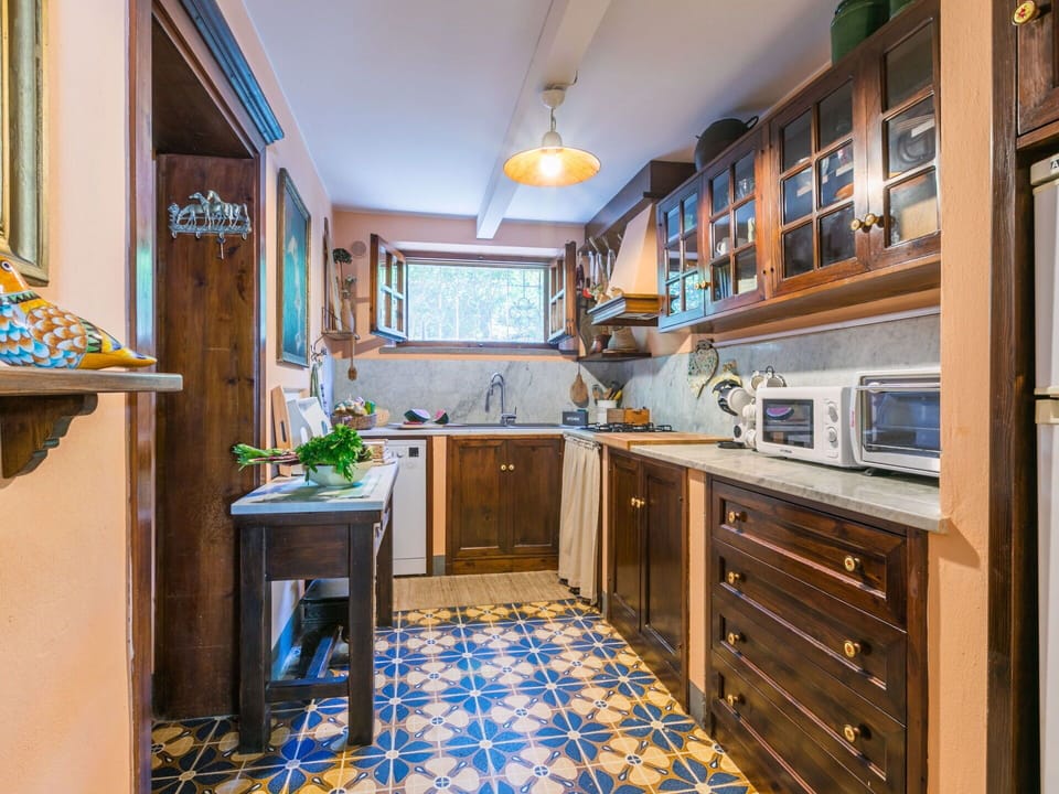 Wood, Flooring, Kitchen, Interior Design, Furniture, Floor, Cabinetry, Countertop, Lighting, Room