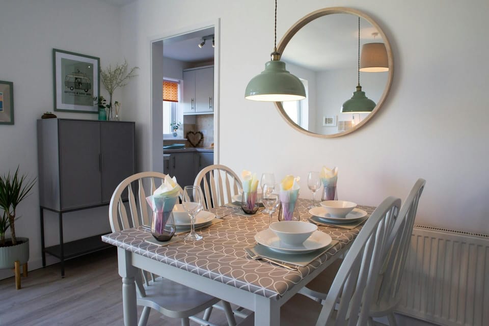 Dining area with door leading to kitchen