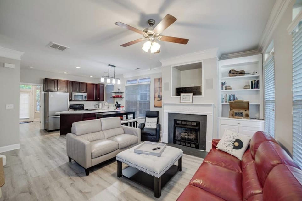 Picture of living room and kitchen from our famous red couch!
