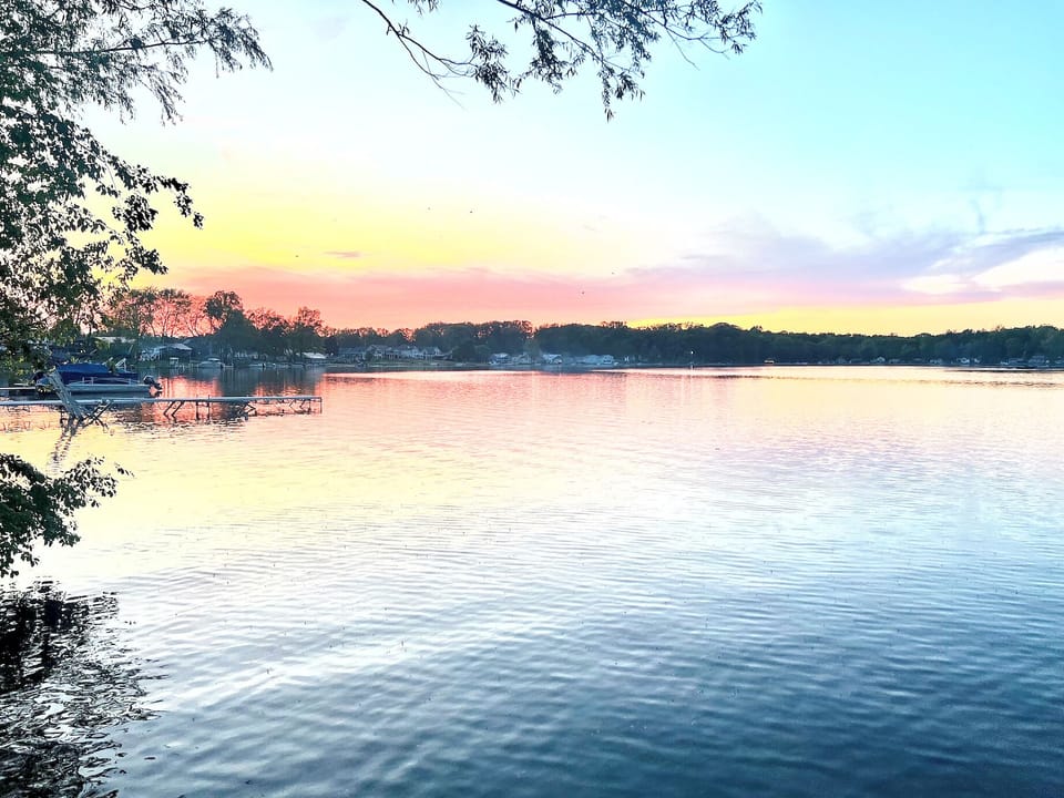 Sunset view of Pretty Lake from the cottage patio