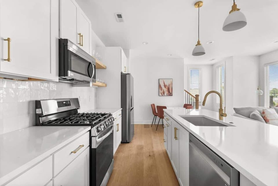 Gas Stove with fully stocked Kitchen with pots and pans
