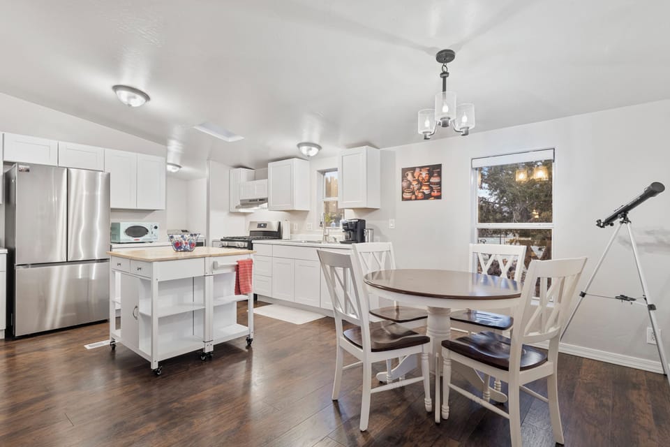 [Kitchen and Dining] Enjoy the sunrise from this window with some coffee! Eating utensils and spices included.