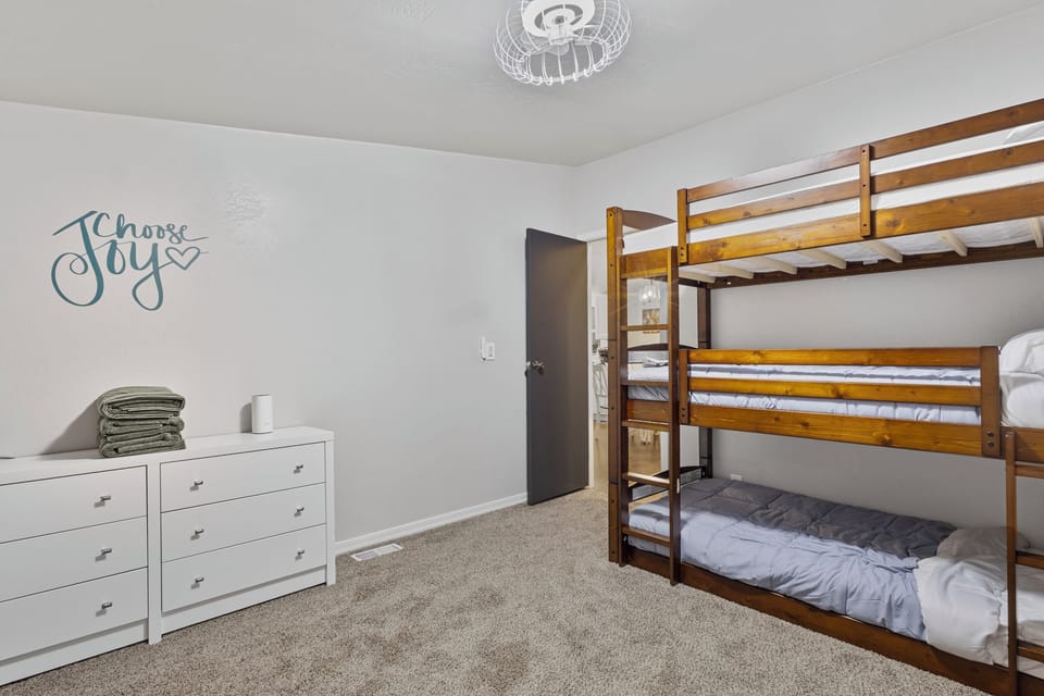 [Kids Room] Three twin beds for the kids! Behind you is a walk-in closet.