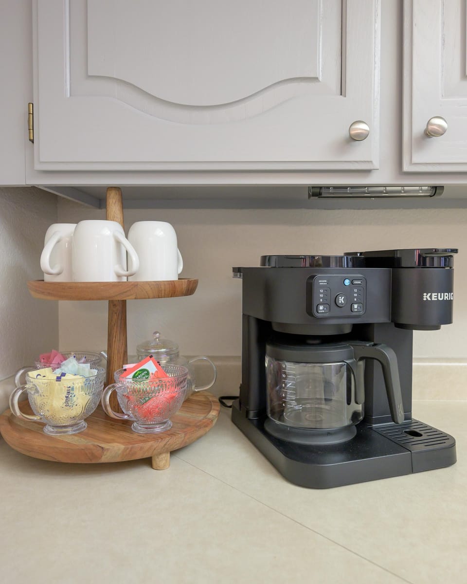 Dual drip/K-Cup coffee maker and sugars supplied.