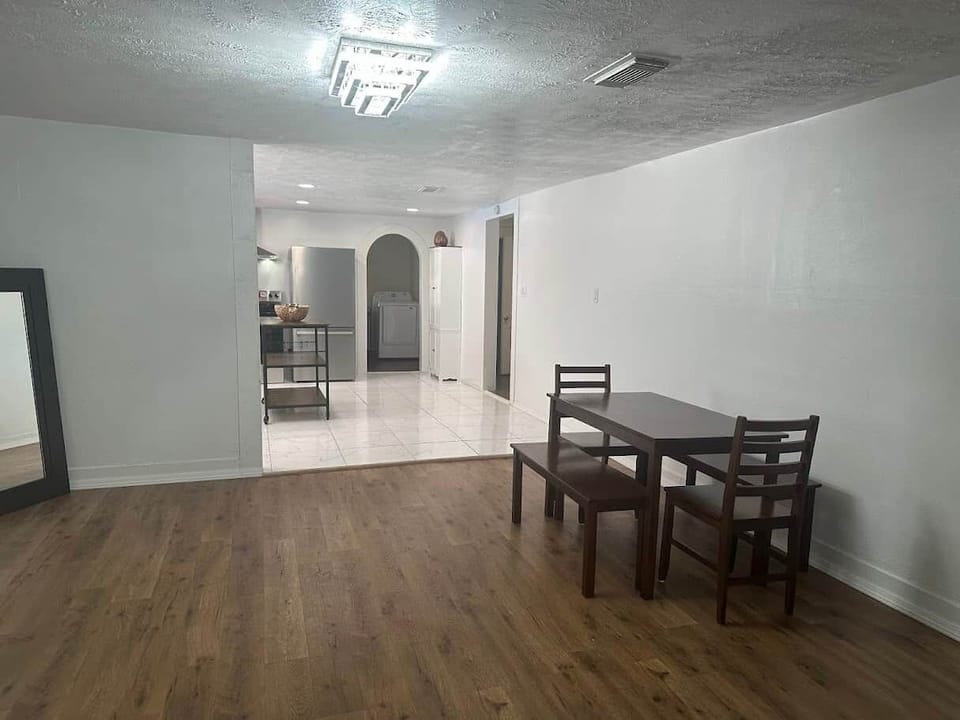 Dining area leading to kitchen