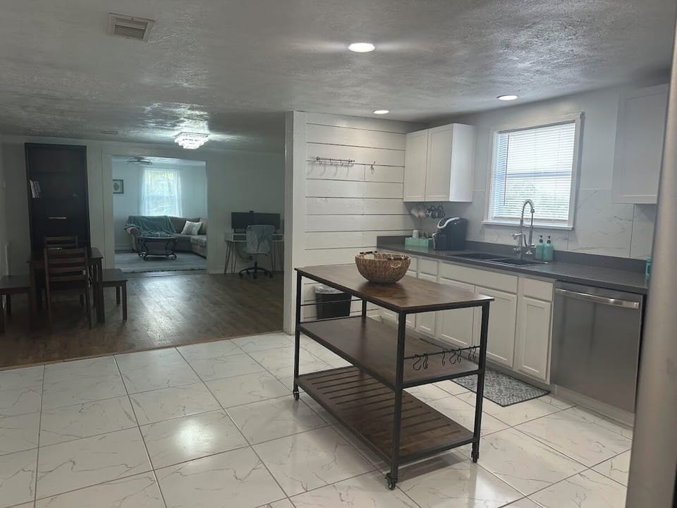View of kitchen back into dining/ office