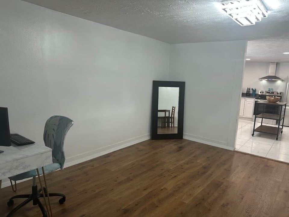 Dining area with dedicated workspace with two monitors