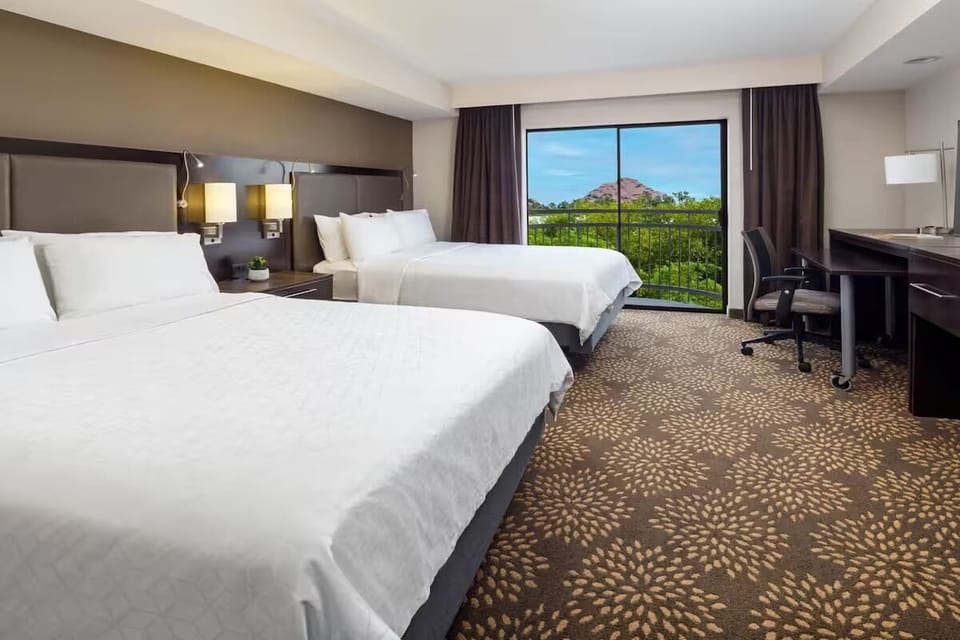 Stretch out in double beds with gorgeous mountain-view windows.