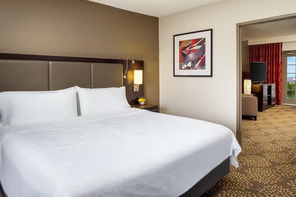 Unwind in crisp linens and a calm, quiet retreat.