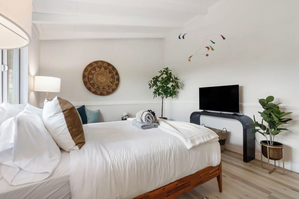 Bedroom two with smart tv and access to shared bath.
