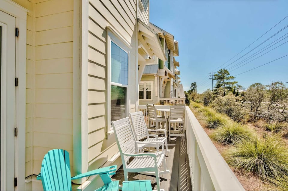 Large patio off living room includes plenty of seating options.