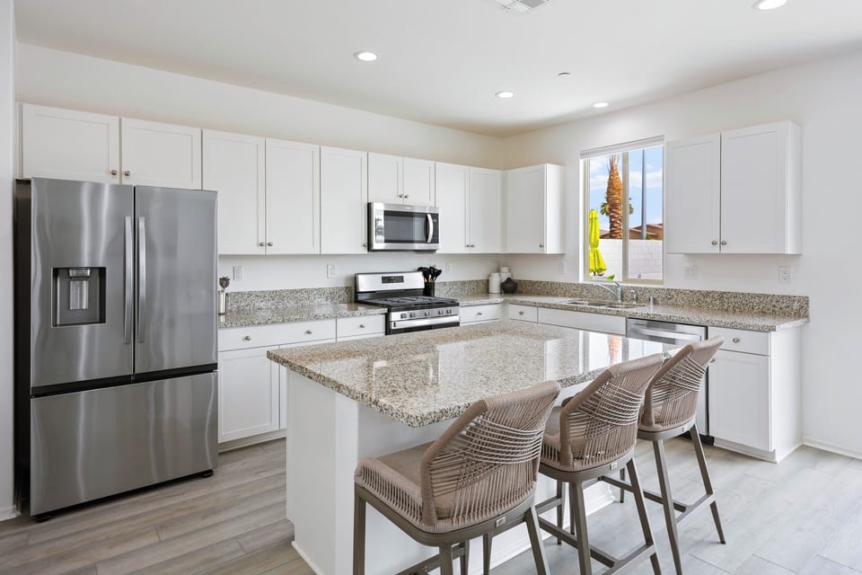 The home features a fully stocked kitchen with everything you need.
