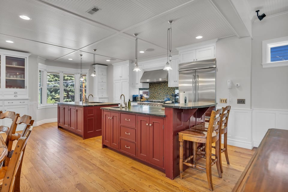 Kitchen: Main floor, drip coffee maker, Keurig, toaster, cooking utensils, tableware