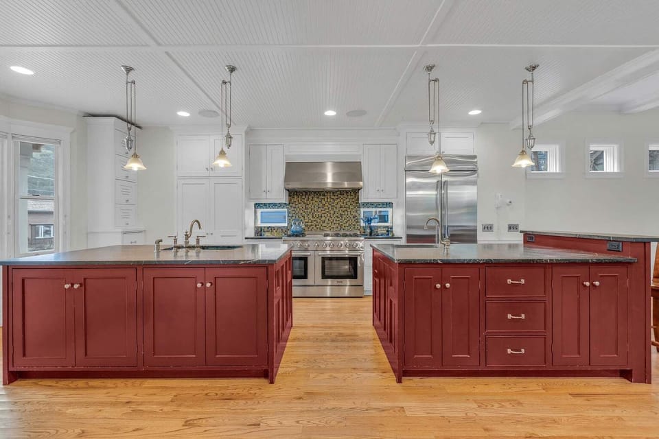 Kitchen: Main floor, drip coffee maker, Keurig, toaster, cooking utensils, tableware