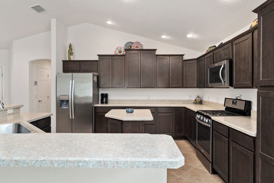 Fridge with ice/water dispenser and gas stove