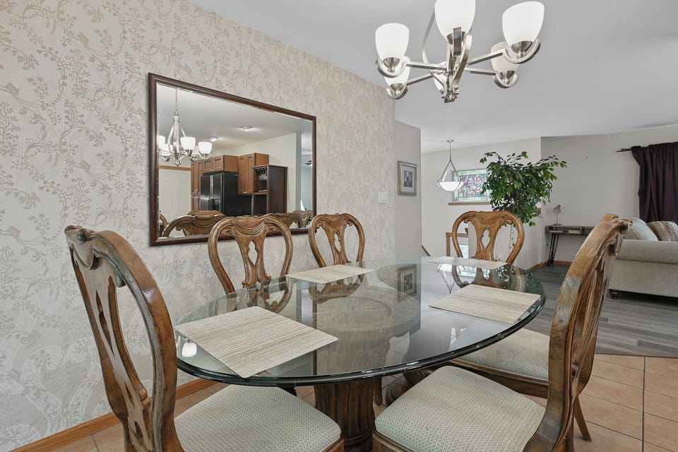 Bright dining space with easy deck access.