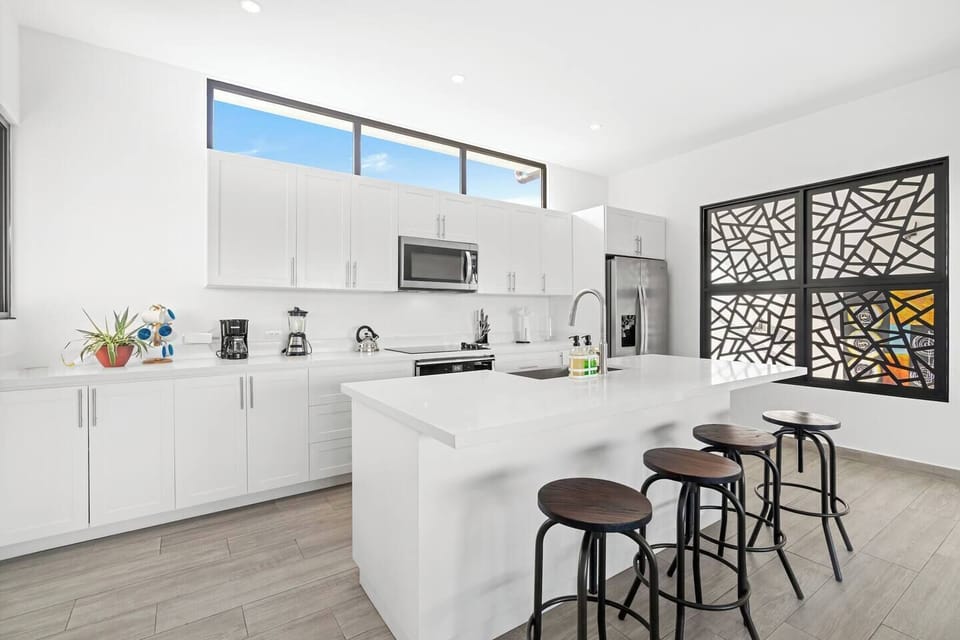 The breakfast bar is great for enjoying a meal, catching up on emails, or sharing a conversation.