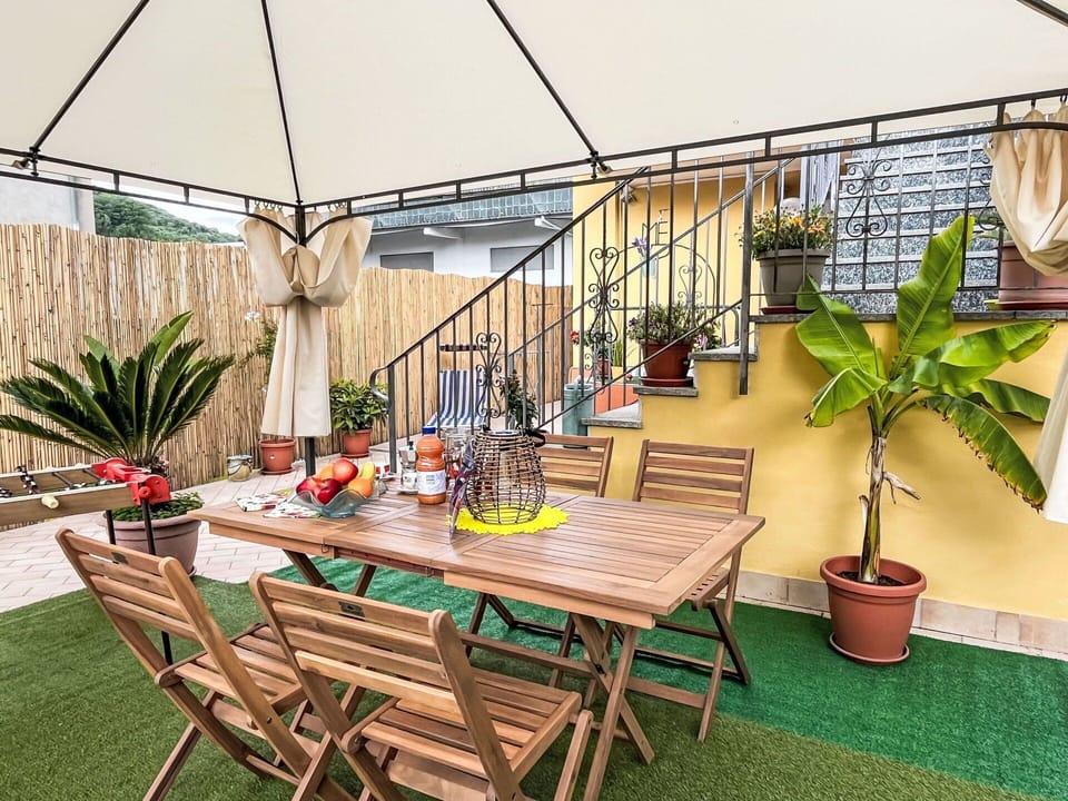 Furniture, Flooring, Outdoor Furniture, Floor, Chair, Flowerpot, Outdoor Table, Shade, Houseplant, Garden