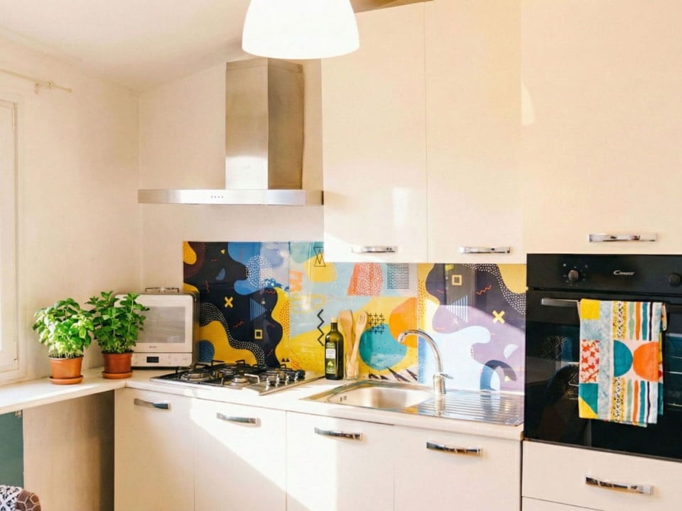 Kitchen, Interior Design, Yellow, Kitchen Appliance, Major Appliance, Countertop, Kitchen Stove, Room, Orange, Ceiling