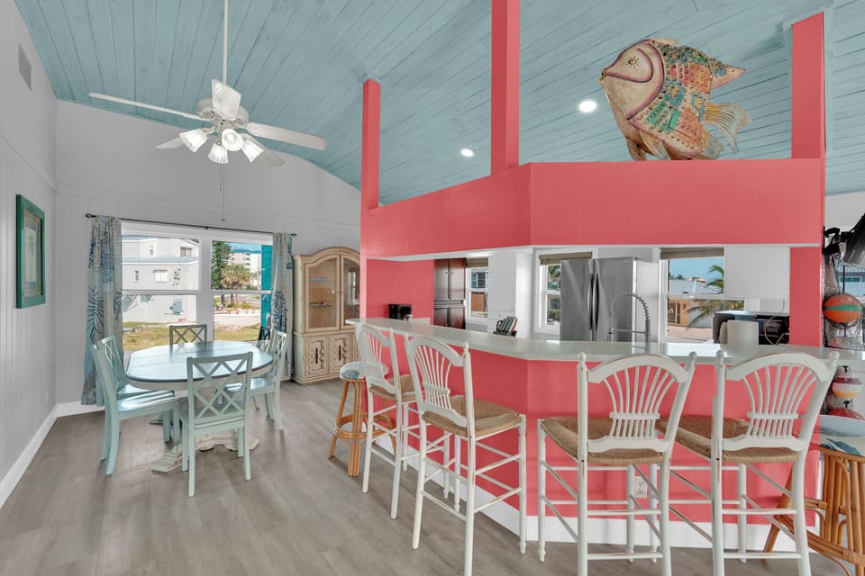 Dining table and additional seating at the bar