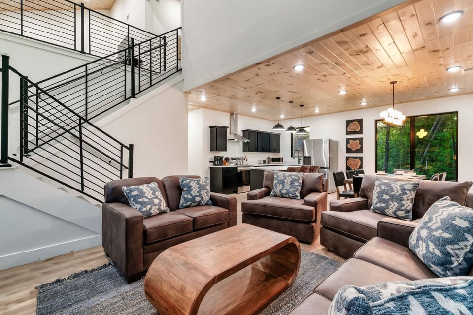 Modern decor blends comfort and style, inviting you to unwind in nature’s embrace!