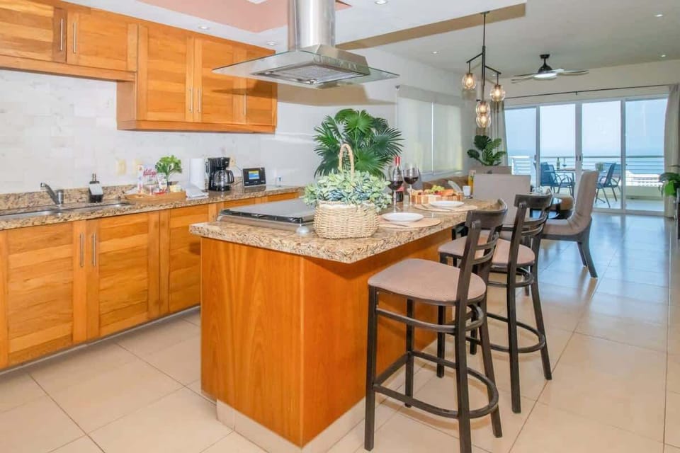 The breakfast bar provides additional space for indoor dining or working on your laptop