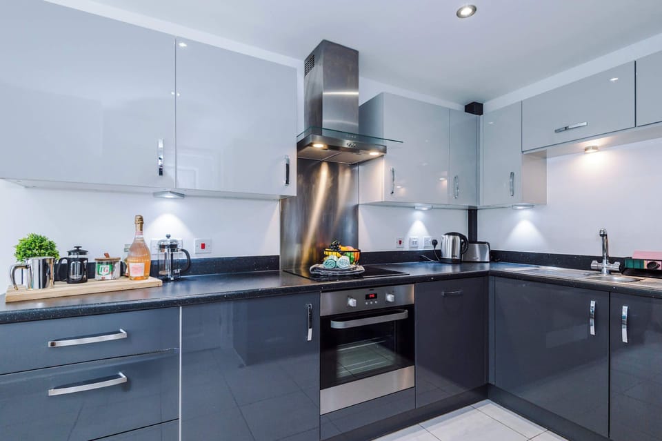 The modern kitchen is equipped with everything you need to prepare a meal whilst away. It features a toaster, kettle, microwave, coffee machine, dishwasher and washing machine!