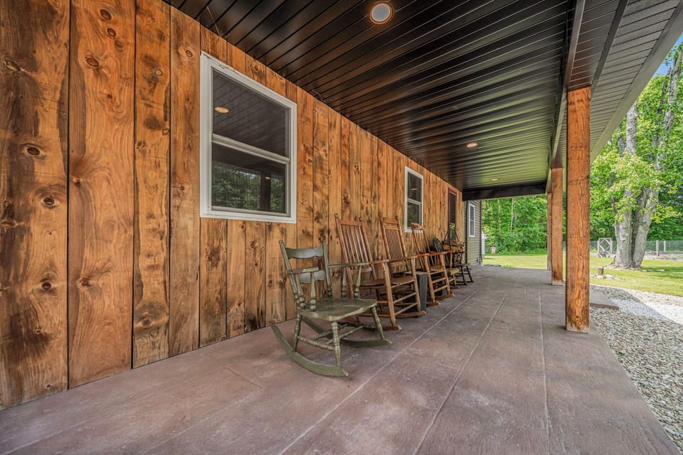 Enjoy the country view on the front porch rocking chairs
