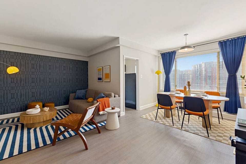 Relax in a cozy, modern living room with a sofa that easily converts into a comfy bed for extra guests.