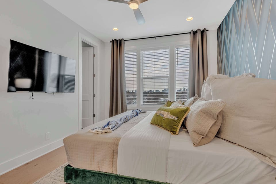 *Expansive primary suite is well appointed with a king size bed, luxurious linens, SmartTV, large walk-in closet, and plenty of space to stretch out and settle in to this Music City Dream Home.