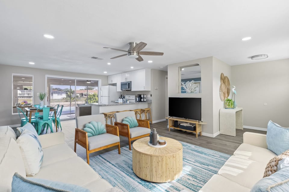 Living room in an open floor concept wit the dining and kitchen
