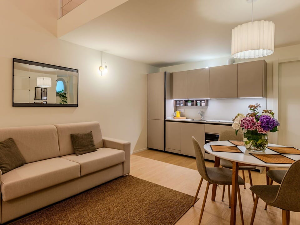 Furniture, Interior Design, Flooring, Floor, Wood, Ceiling, Room, Textile, Couch, Lighting