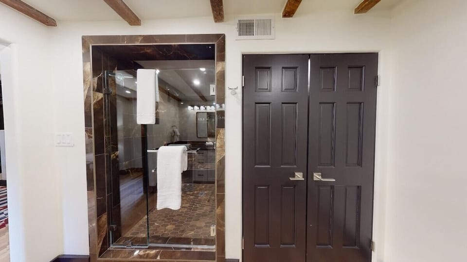 Guest bathroom shower with soaps provided