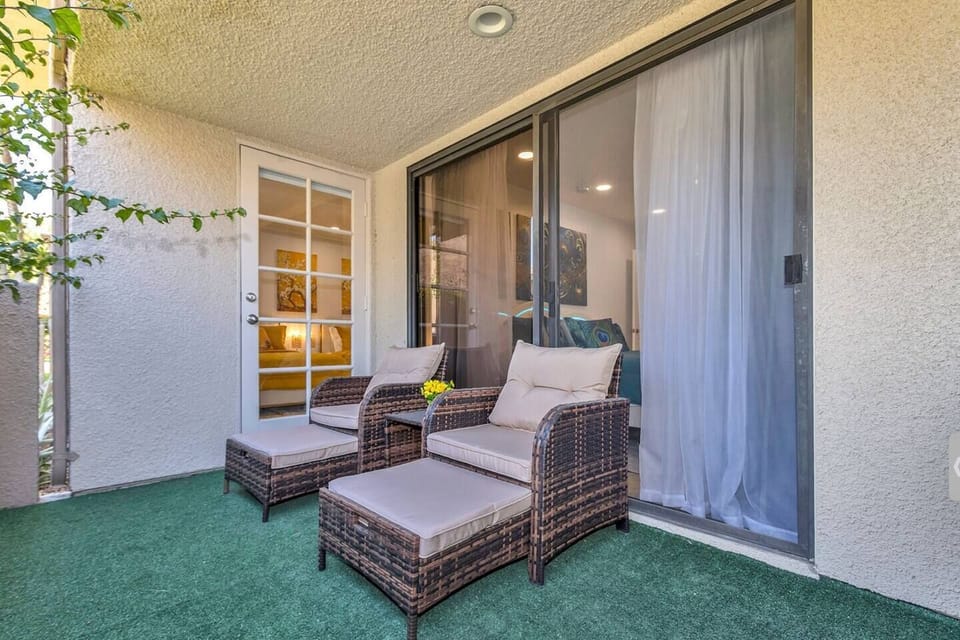 Cozy private patio with direct entrance to second bedroom.