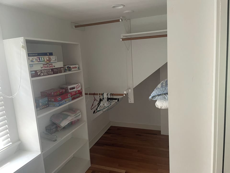 Walk-in closet in upstairs bedroom