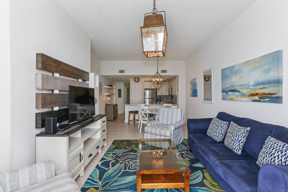 The living room is open to the dining area and kitchen