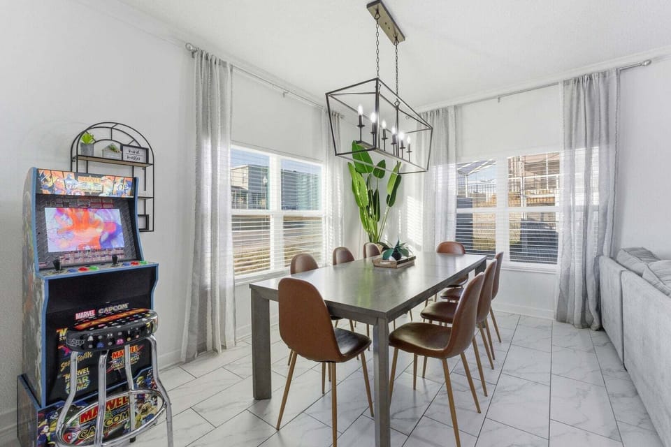 Comfortable dining room with seating for 8, plus 4 more at the kitchen bar for casual dining